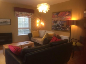 Secluded ground floor village centre apartment